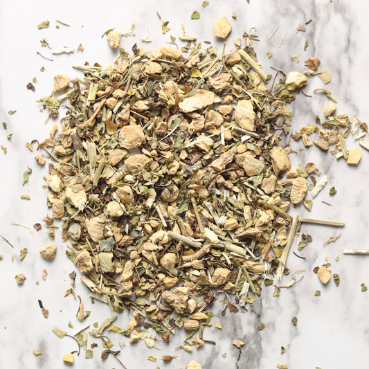 Dry herbs on a marble surface